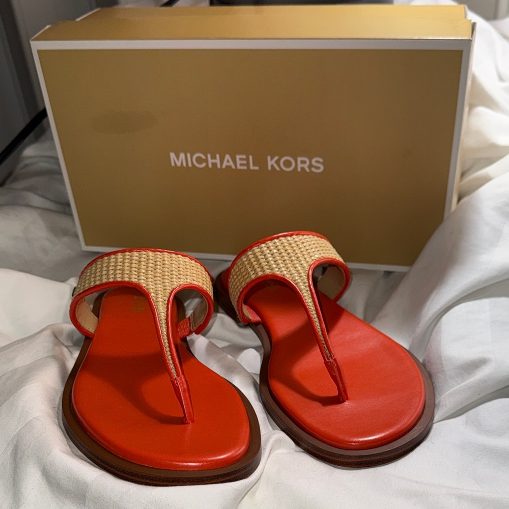NWOT - Michael Kors Carson Flat Thong Sandals. Woven Straw. Color Red Clay.